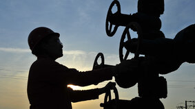 Oil field oil workers at work