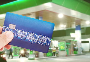 Credit card to make a payment for refueling car on gas station