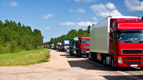 Traffic jam congestion. Trucks in a row. Congestion.