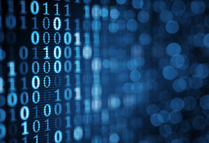 blue digital binary data on computer screen. Close-up shallow DOF
