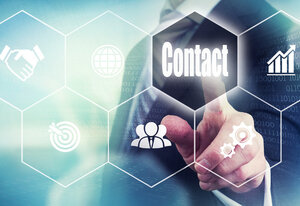 Businessman pressing a Contact concept button.