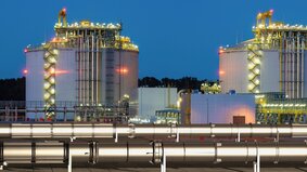 pipelines in the LNG terminal at night,3d illustration