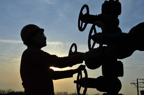 Oil field oil workers at work